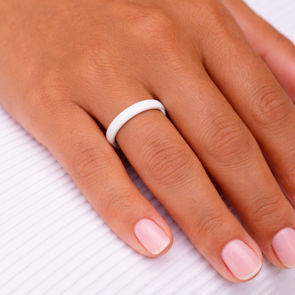 Woman wearing Twinn Ultra White ceramic contactless payment ring