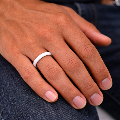 Man wearing Twinn Ultra White ceramic contactless payment ring